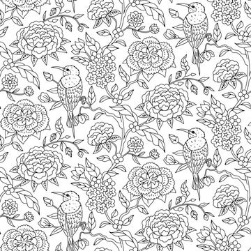 Seamless pattern with monochrome black and white chinoiserie hand drawn flowers and birds motifs. Floral wallpaper with chinese style ornament.