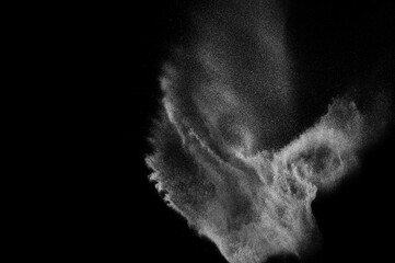 Abstract dust overlay texture. Motion of white particles on black background. Powder explosion.	