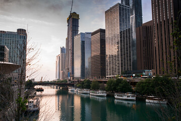 Fototapeta na wymiar Chicago River in Chicago surrounded by the skyscrapers