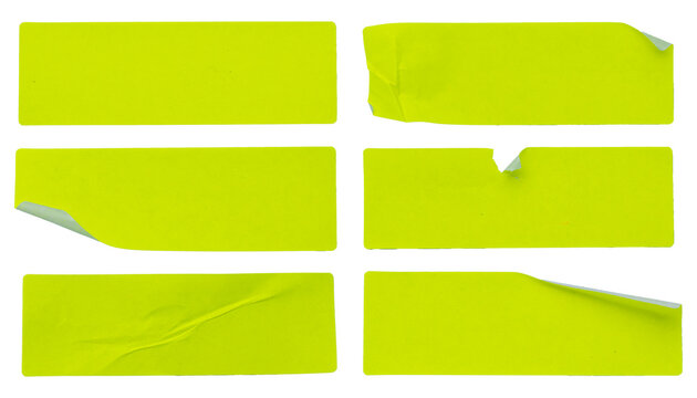 A set of fluorescent neon yellow rectangular paper sticker label isolated on white background.