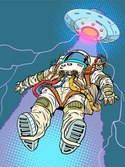 Pop Art Retro The astronaut is lifted towards himself by a flying saucer beam. Paranomal phenomena in the galaxy and aliens. Exploring the universe in search of life. - 770418427
