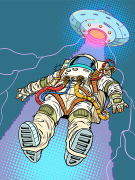Pop Art Retro The astronaut is lifted towards himself by a flying saucer beam. Paranomal phenomena in the galaxy and aliens. Exploring the universe in search of life.