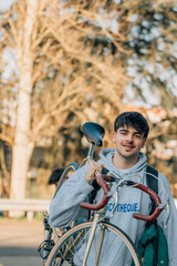 Obraz premium student with vintage bicycle and young american outfit