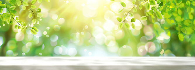 View of an empty wooden table top in a garden. Image with a gentle blurred soft light background of garden foilage. Bokeh effect. Spring, summer holiday concept with copy space for your product or ad.