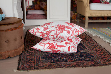 white pillows with red pattern