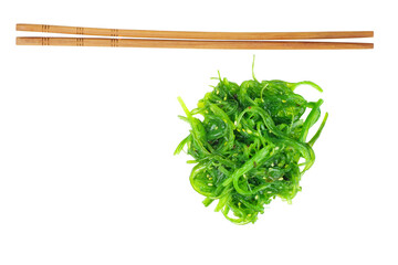 Wakame seaweed and chopsticks isolated on white background