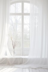 Bright room with sheer curtains and vase