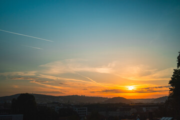 Beautiful orange sunrise on the horizon over the city landscape
