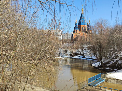 Church domes by the spring river