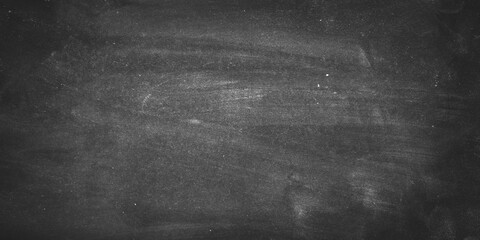 Seamless polished dark concrete floor or old grunge texture, old vintage charcoal black chalkboard or blackboard, Dark wallpaper grunge texture copy space, Texture of a grungy black concrete.