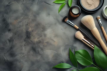 Foto op Plexiglas A makeup brush set is displayed on a grey background with a leafy green background. The brushes are arranged in a way that they look like they are ready to be used. Scene is one of beauty and elegance © Nataliia_Trushchenko