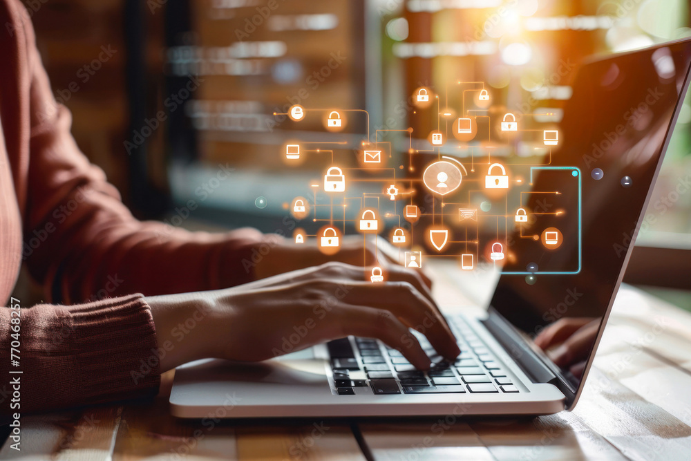 Poster close-up of user's hands on laptop emphasizing cybersecurity elements with a digital interface