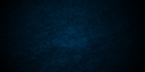Dark and light blue grunge backdrop texture, watercolor painted mottled blue background, modern colorful concrete dirty smooth ink textures on black paper background.