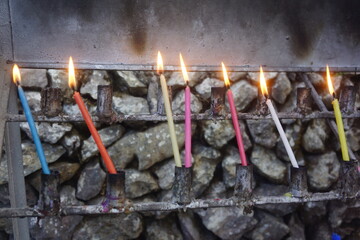 candles lit on Baguio City Lourdes Grotto prayer area 2
