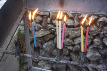 candles lit on Baguio City Lourdes Grotto prayer area 1