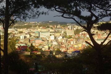 An portion of Baguio City brightly lit on sunset