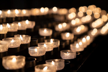 beautiful bokeh candles in a church