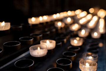 beautiful bokeh candles in a church