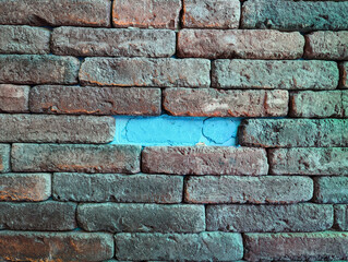 old brick wall, Brick wall background, a brick wall with a blue mark in the middle.