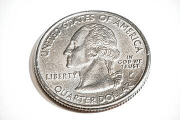 An aged or used Quarter Dollar at 2:1 Magnification, and on a white background.