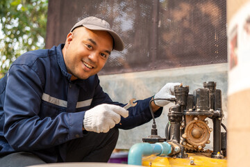 Male Plumber worker installation pipe system hand holding the water tap faucet. Plumbing checking service and repair.