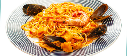 Pasta with seafood on a white background with clipping path