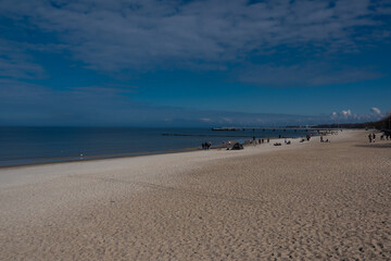 sand beach on Baltic Sea. Kolobrzeg, Poland - obrazy, fototapety, plakaty