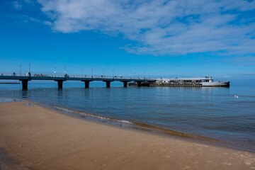 Obraz premium Pier and coast of the Baltic Sea. Kolobrzeg, Poland