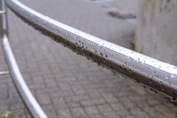 stainless steel railing in the rain