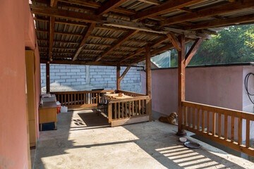 Fototapeta premium very nice wooden outdoor yard with a dog take care 