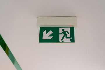 emergency exit sign on a wall