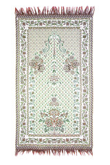 A prayer rug used by Muslims for prayer. Isolated prayer rug on a white background.