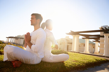 Meditation, prayer pose and people at yoga retreat with balance, peace and relax in mindfulness at...