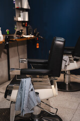 Workplace in a barbershop with chairs and a mirror