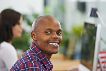 African man, portrait and smile with happy creative career, web designer in office with...