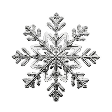 A single delicate snowflake its symmetry isolated on transparent background, cut out, png