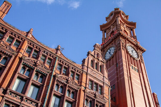Manchester England - 13.10.2013: Kimpton Clocktower Hotel (with Palace lettering) on blue sky sunny day on Oxford Street