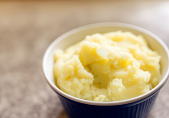 Close up of bowl of mashed potatoes - 770615029