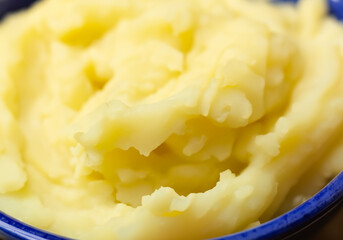 Close up of bowl of mashed potatoes - 770615060