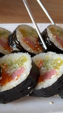Japanese chef preparing a meal in a restaurant. High quality 4k footage