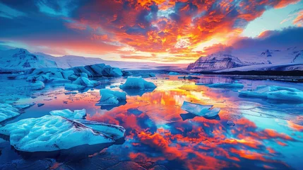  An evening photograph of the serene beauty of glaciers and icebergs in Iceland, with vibrant colors reflecting off their surfaces under an orange sunset sky © Kien