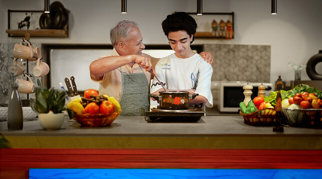 Indian Asian happy old aged chef man teen child talk modern home kitchen older elder male teach learn young adult boy hold spatula spoon stir mix fresh vegan food enjoy cook class fun joy indoor house