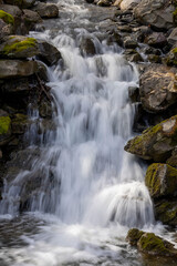 Fototapeta na wymiar Small waterfall after heavy rain in upstate NY