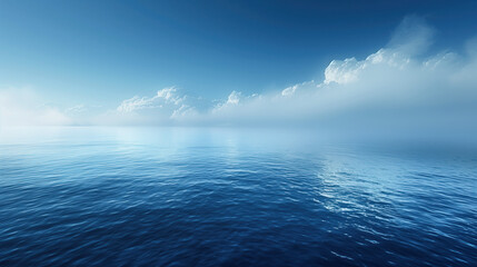 Fototapeta premium calm sea with soft waves and a horizon flush with a clear sky and diluted with clouds