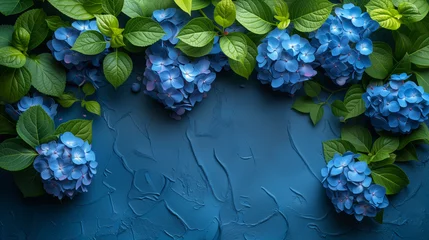 Foto op Aluminium Blue hydrangea flowers on blue background. Flat lay, top view. © Виктория Дутко