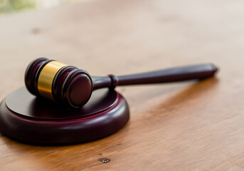 Close up Judge Gavel on a wooden table - obrazy, fototapety, plakaty