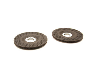 Two aluminum oxide general purpose griding wheels, manufactured with heat treated grit grains in high concentrations for smooth when cutting steel and ferrous metals, stone, isolated background