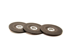 Three aluminum oxide general purpose griding wheels, manufactured with heat treated grit grains in high concentrations smooth when cutting steel and ferrous metals, stone, isolated background