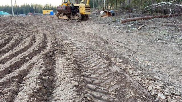 Natural Gas Pipeline Construction site, pipelayer. Transmission in pipe to LNG plant. Building of transit petrochemical pipe in field. Transports crude oil, natural gas, petroleum