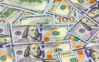 Fototapeta na wymiar Hundreds of new Benjamin Franklin 100 dollar bills